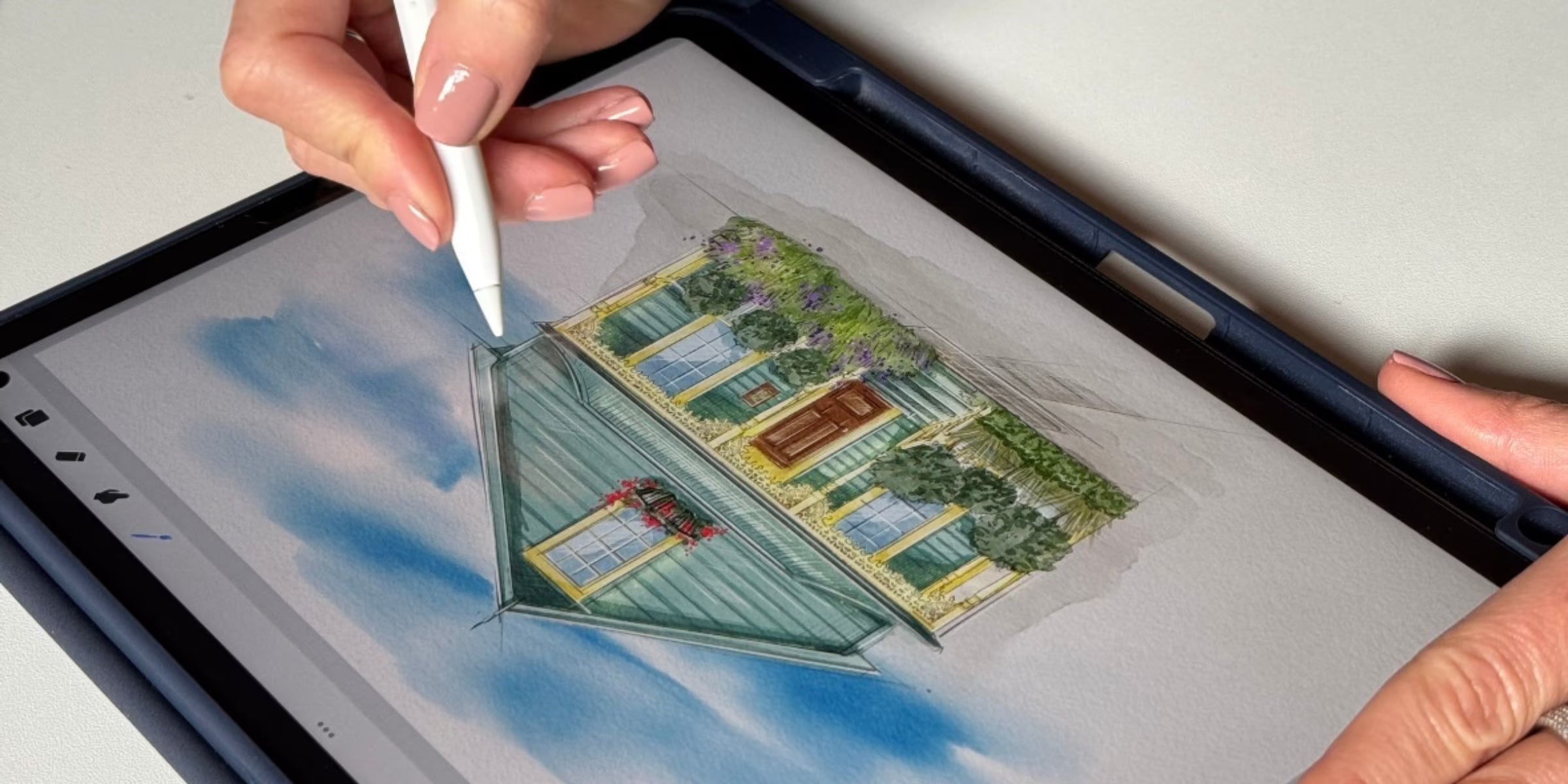 Artist drawing a digital watercolour house portrait on iPad – Revastique Auckland